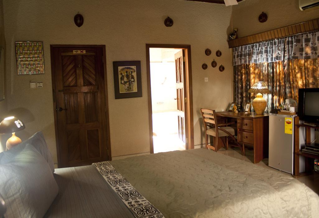 Four Villages Inn Kumasi Værelse billede